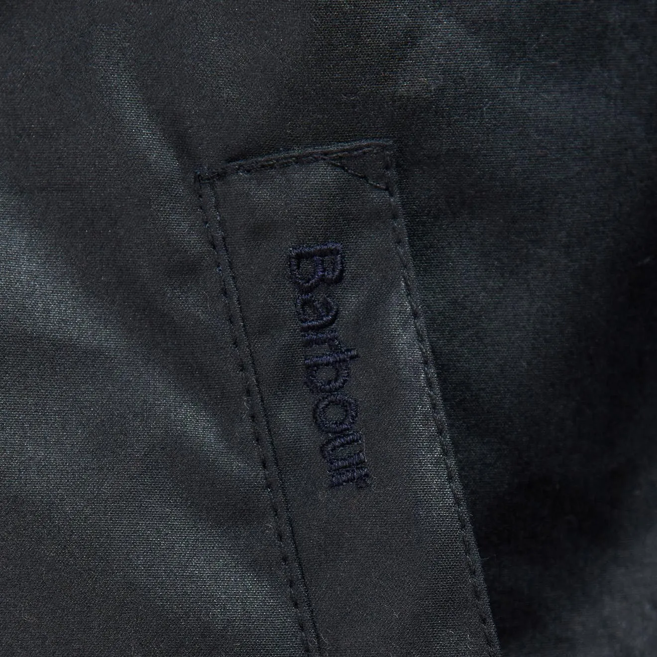 Sure! Heres an optimized title with added modifiers for the product:

Mens Barbour Evelar Navy Waxed Cotton Jacket - Classic Fit, Water-Resistant, Outdoor Style